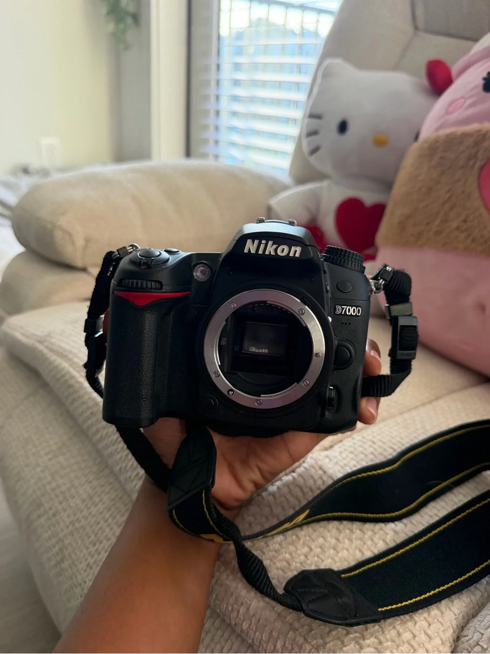Nikon D7000 DSLR Camera Body in Black with Yellow-Trim Strap